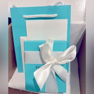 Tiffany box with bow, gift bag, card and envelope.